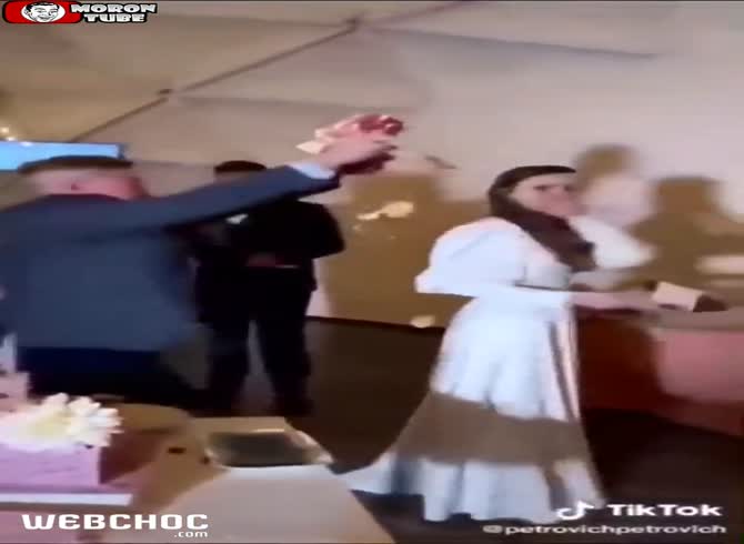 Video :An inebriated man attempts to add ambiance to a wedding